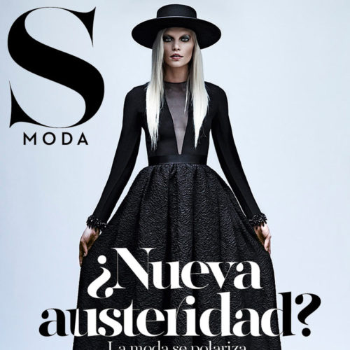Cover of S Moda Magazine with woman in dark dress and hat